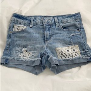 Ripped Jean shorts with lace